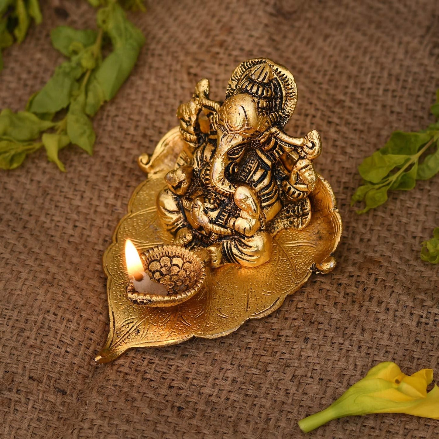 Metal Lord Ganesha on Leaf Idol with Diya