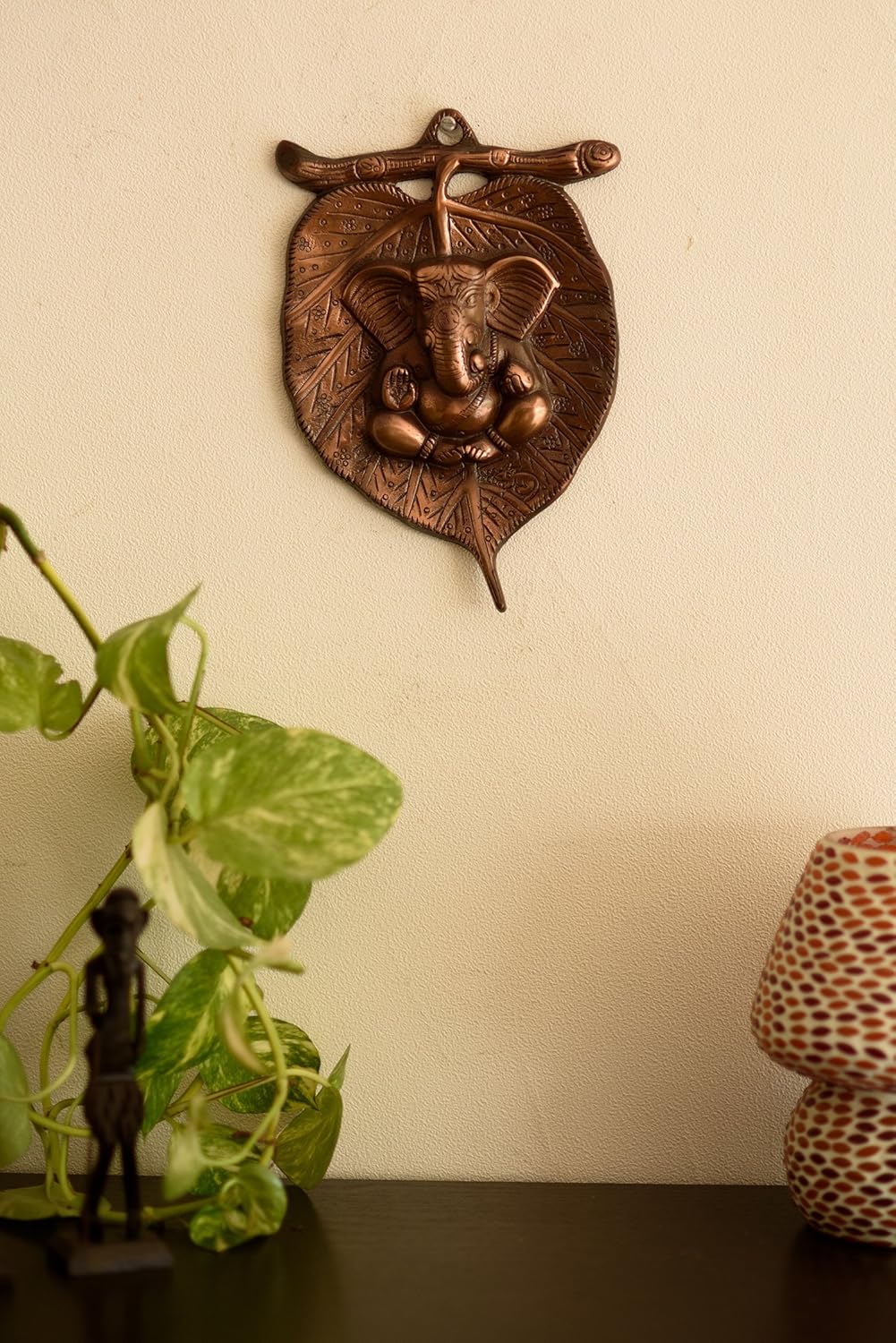Metal wall hanging of Lord Ganesha on Leaf