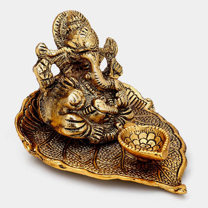 Metal Lord Ganesha on Leaf Idol with Diya