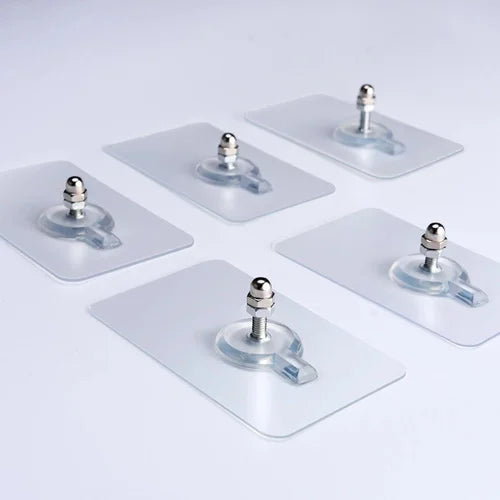 Four plastic plates on a white surface, arranged in different configurations in each section of the image. The plates are circular with a raised outer edge. The background is plain with no discernible details or patterns.
